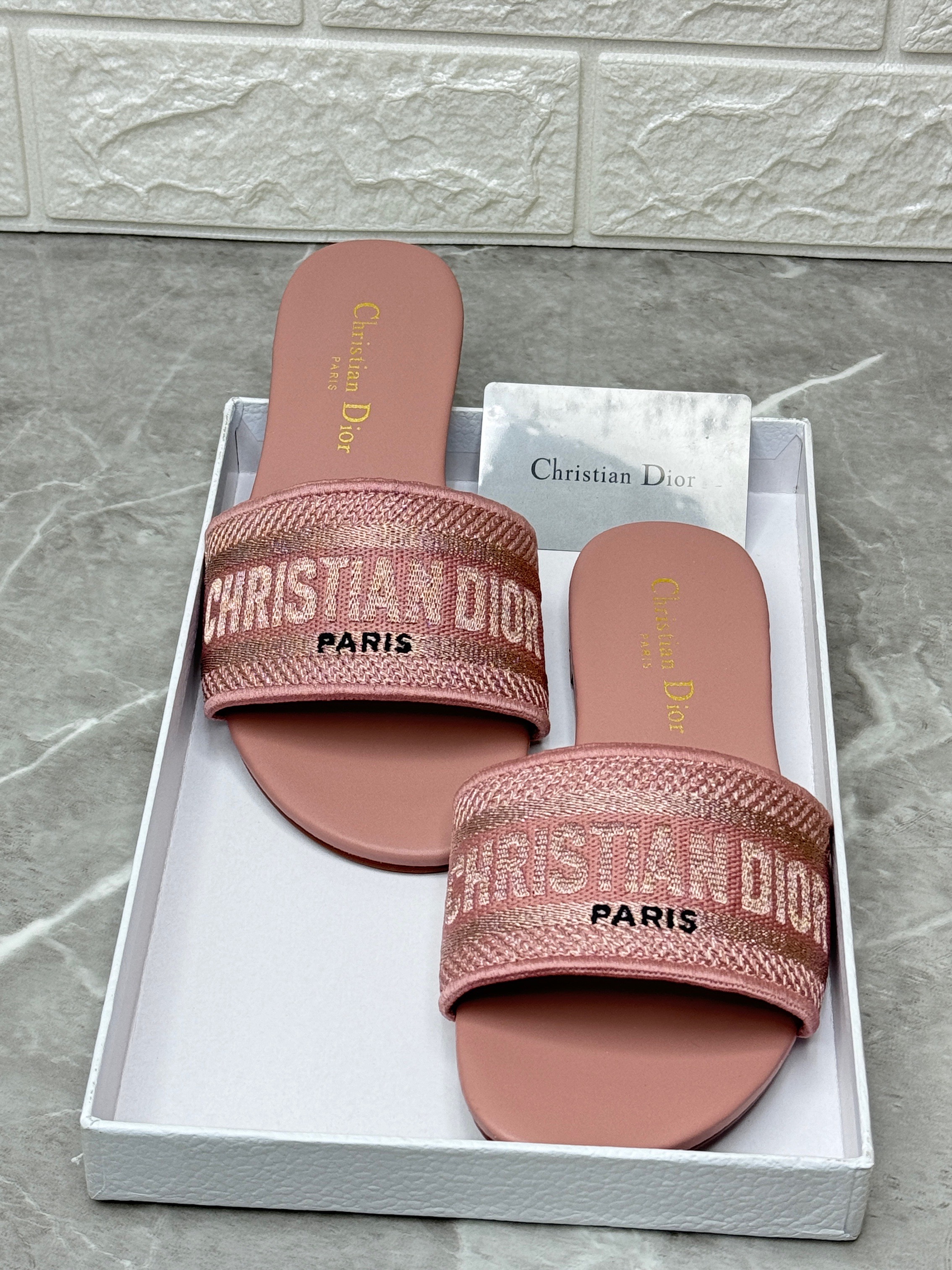Christian Dior Dway slide in pink embroidered cotton with the "Christian Dior Paris" signature. image 1