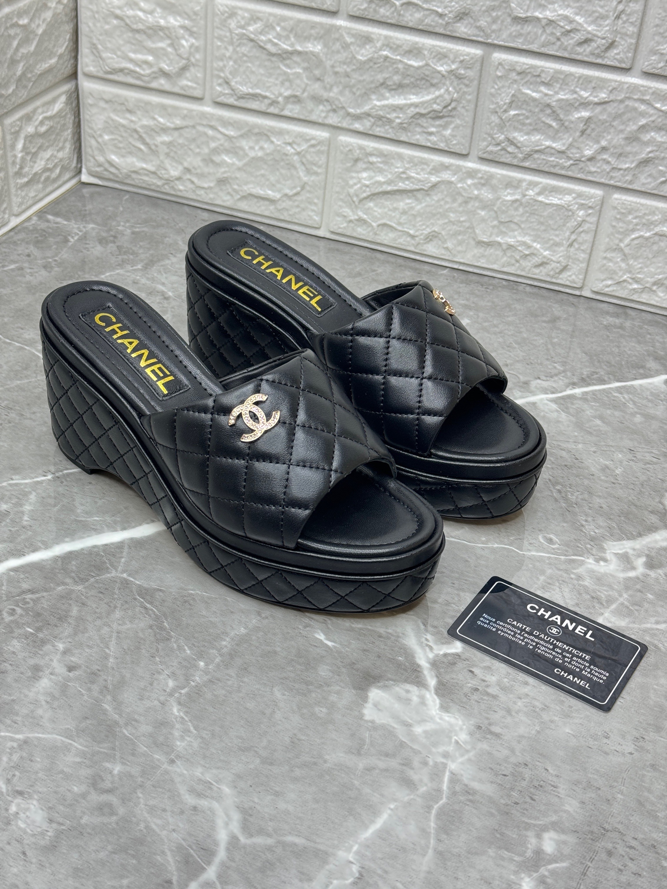 Chanel black quilted leather wedge sandals. image 1