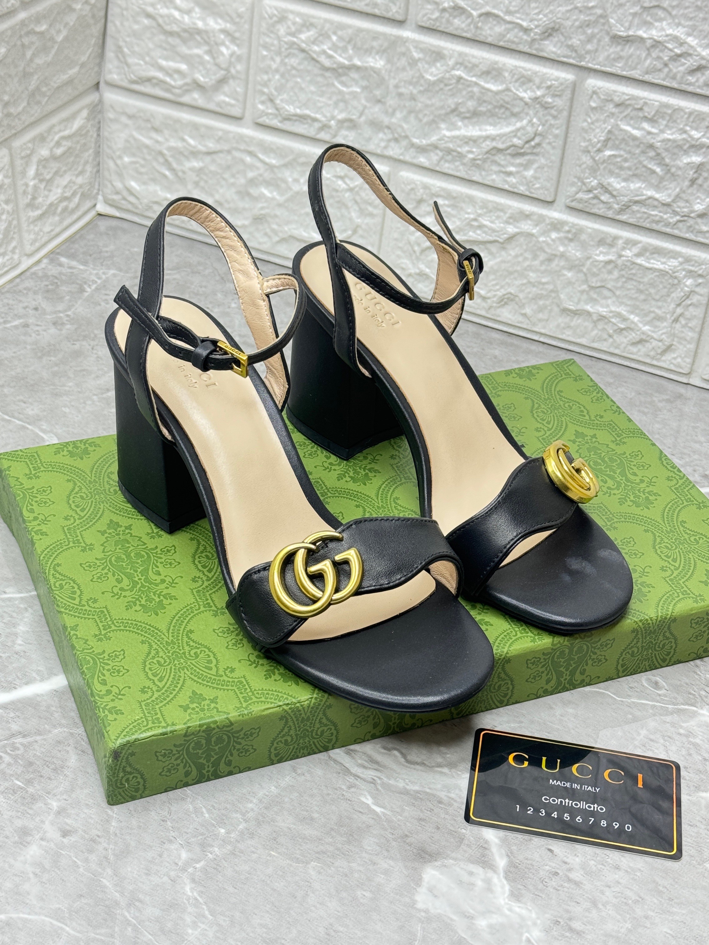 Gucci Marmont leather block-heel sandals in black with a gold-tone 'GG' logo plaque. image 1