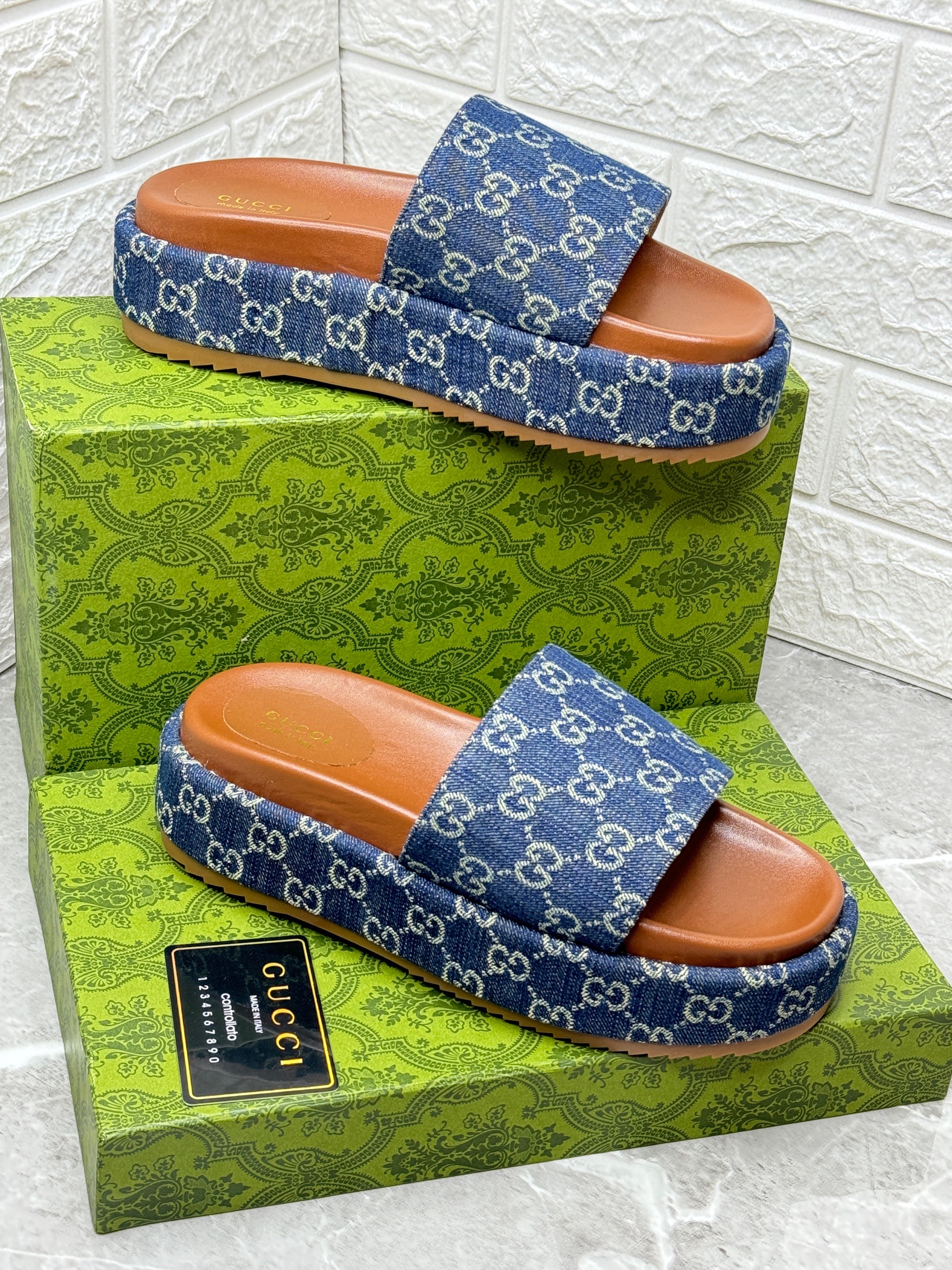 Gucci Denim GG Monogram Angelina Platform Slide Sandals in blue. image 1