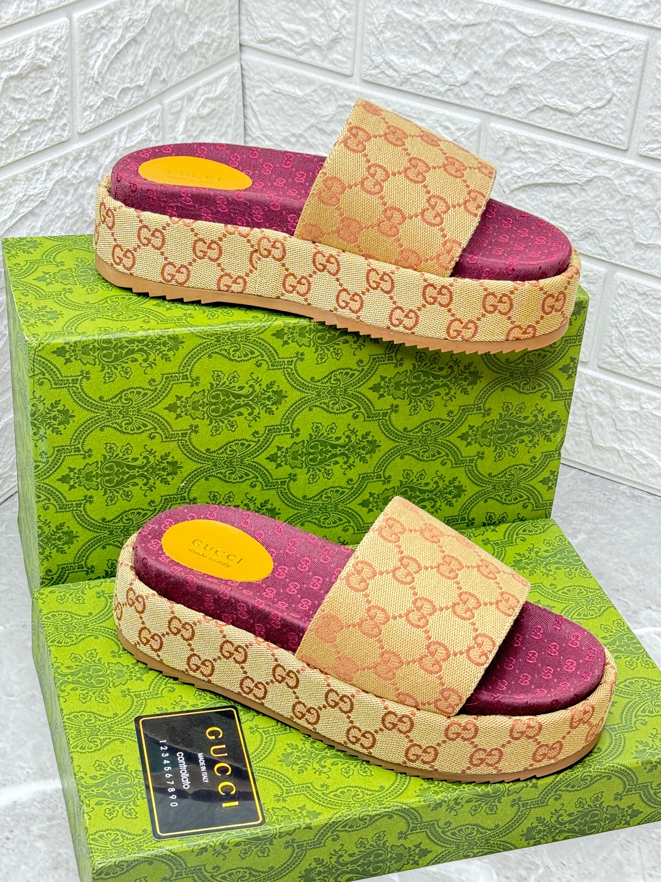 Gucci Angelina GG Logo Platform Slide Sandals, featuring the heritage 'rhombi' logo on a platform sole. image 1