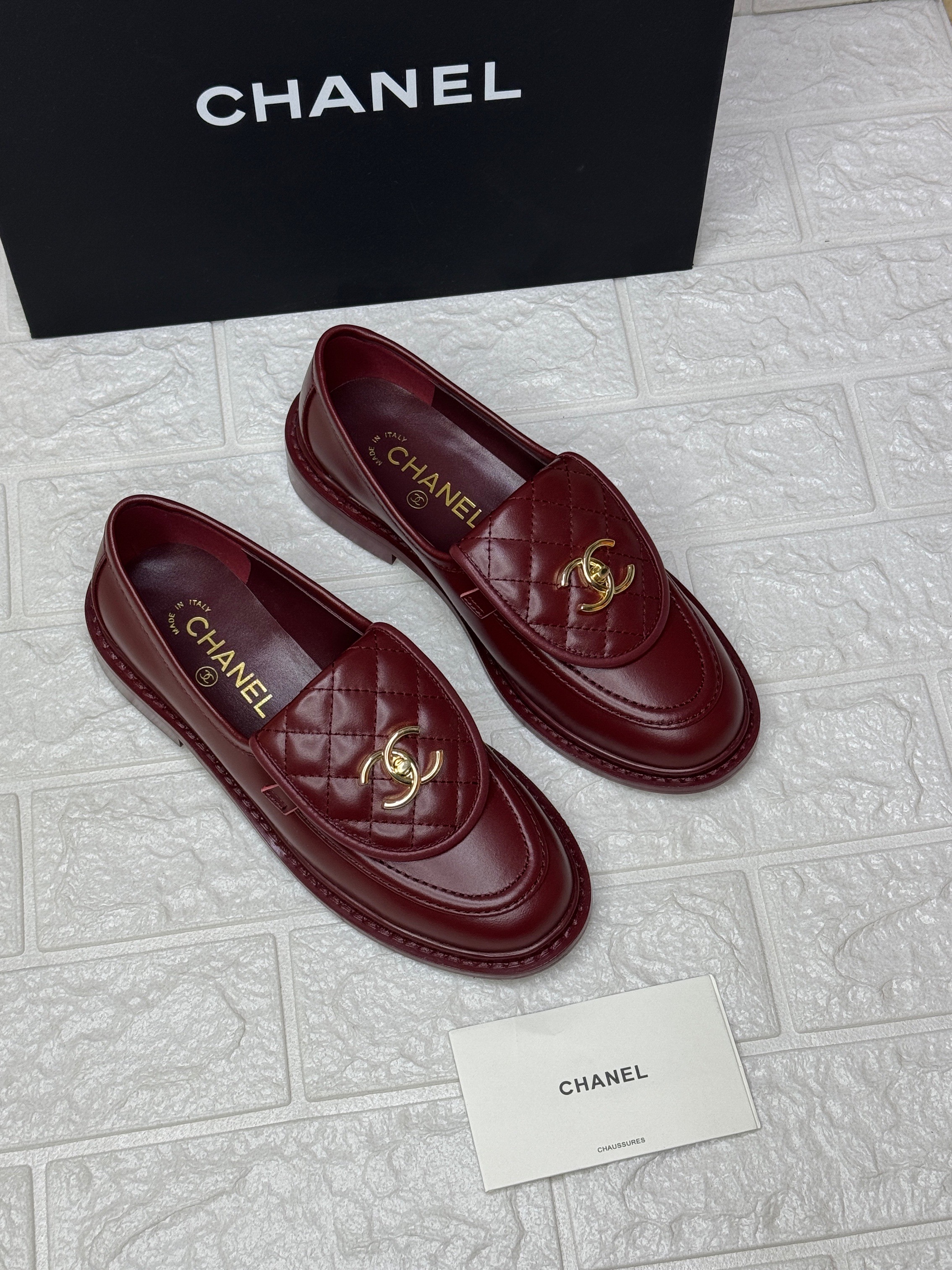Chanel burgundy leather CC loafers. image 1