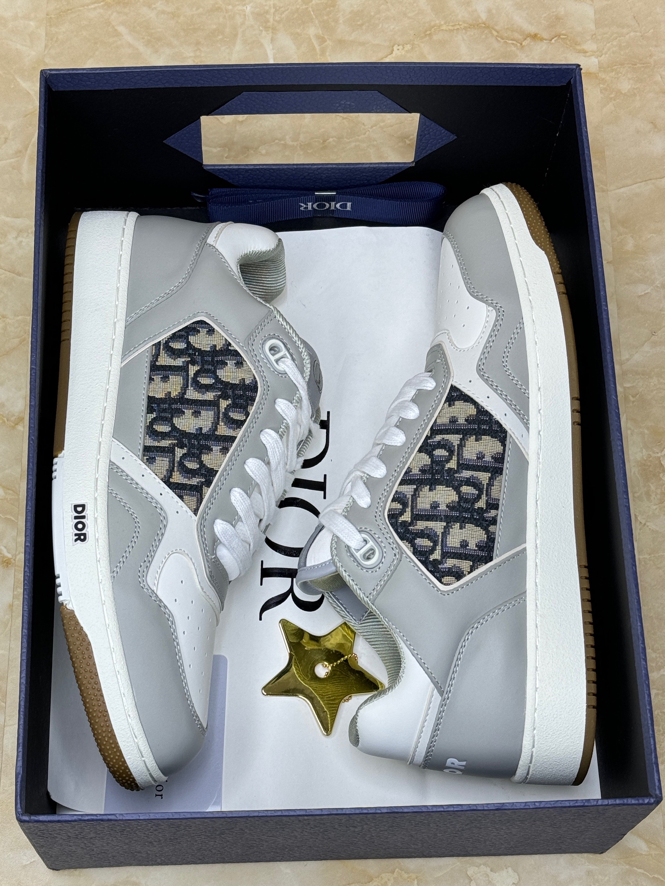 Dior B27 Uptown low-top sneakers in gray and white smooth calfskin with beige and black Dior Oblique jacquard panels. image 1