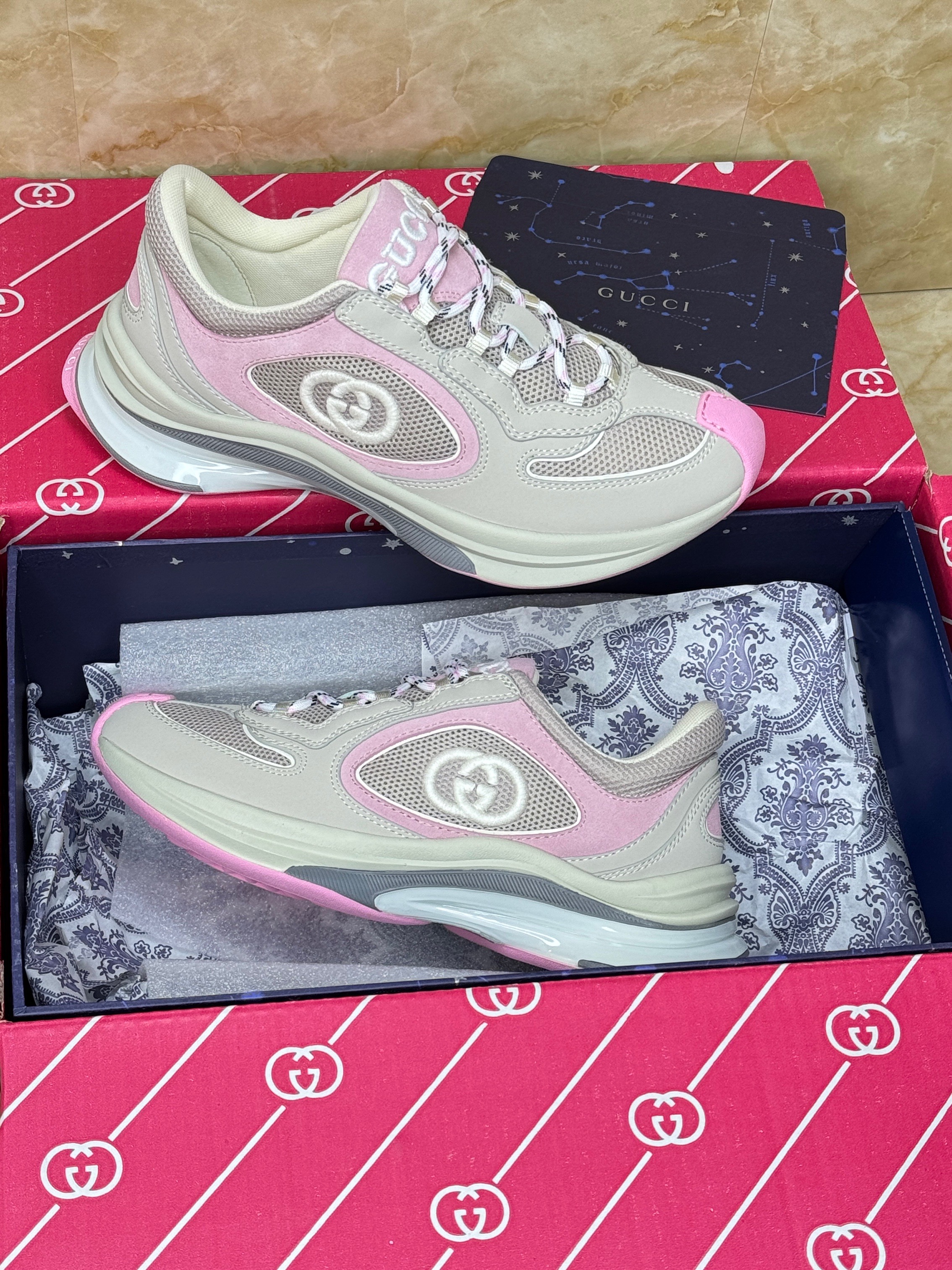 Gucci Run sneakers in ivory, pink, and grey mesh, leather, and suede. image 1