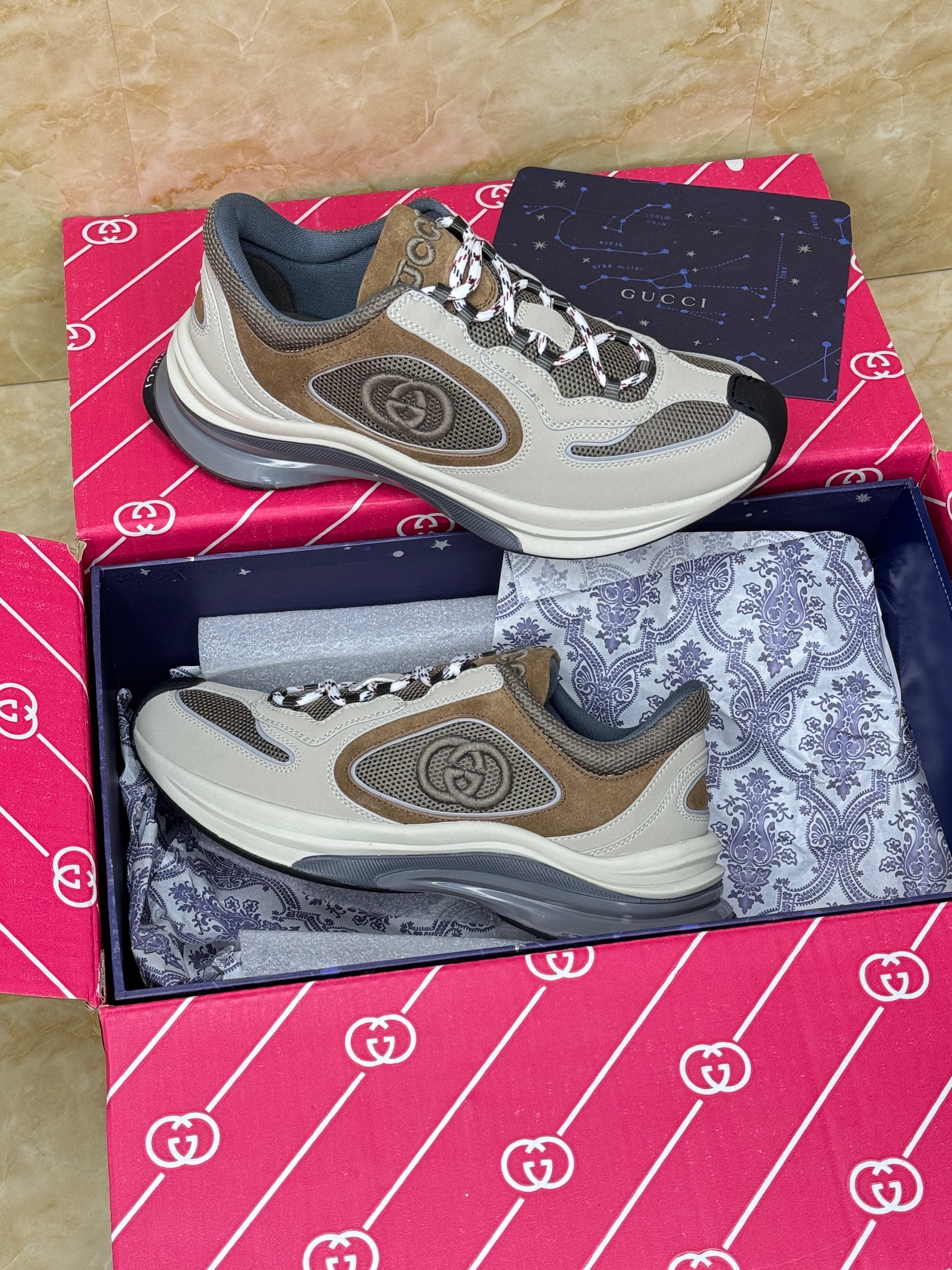 Gucci Run sneakers in a beige and tan suede and technical mesh colorway. image 1