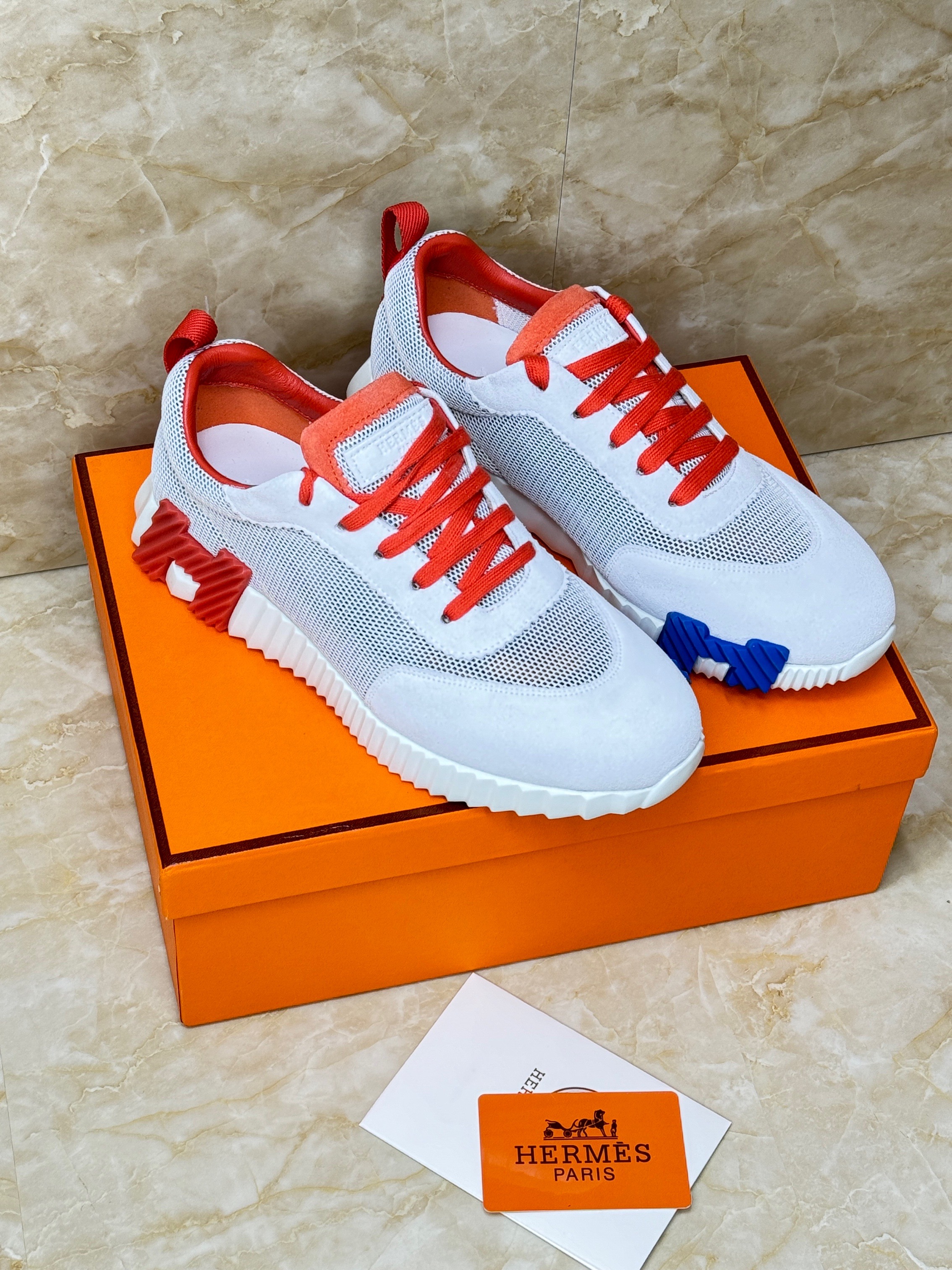 Herm?s Bouncing sneakers in white technical mesh and suede goatskin with red laces and accents. image 1