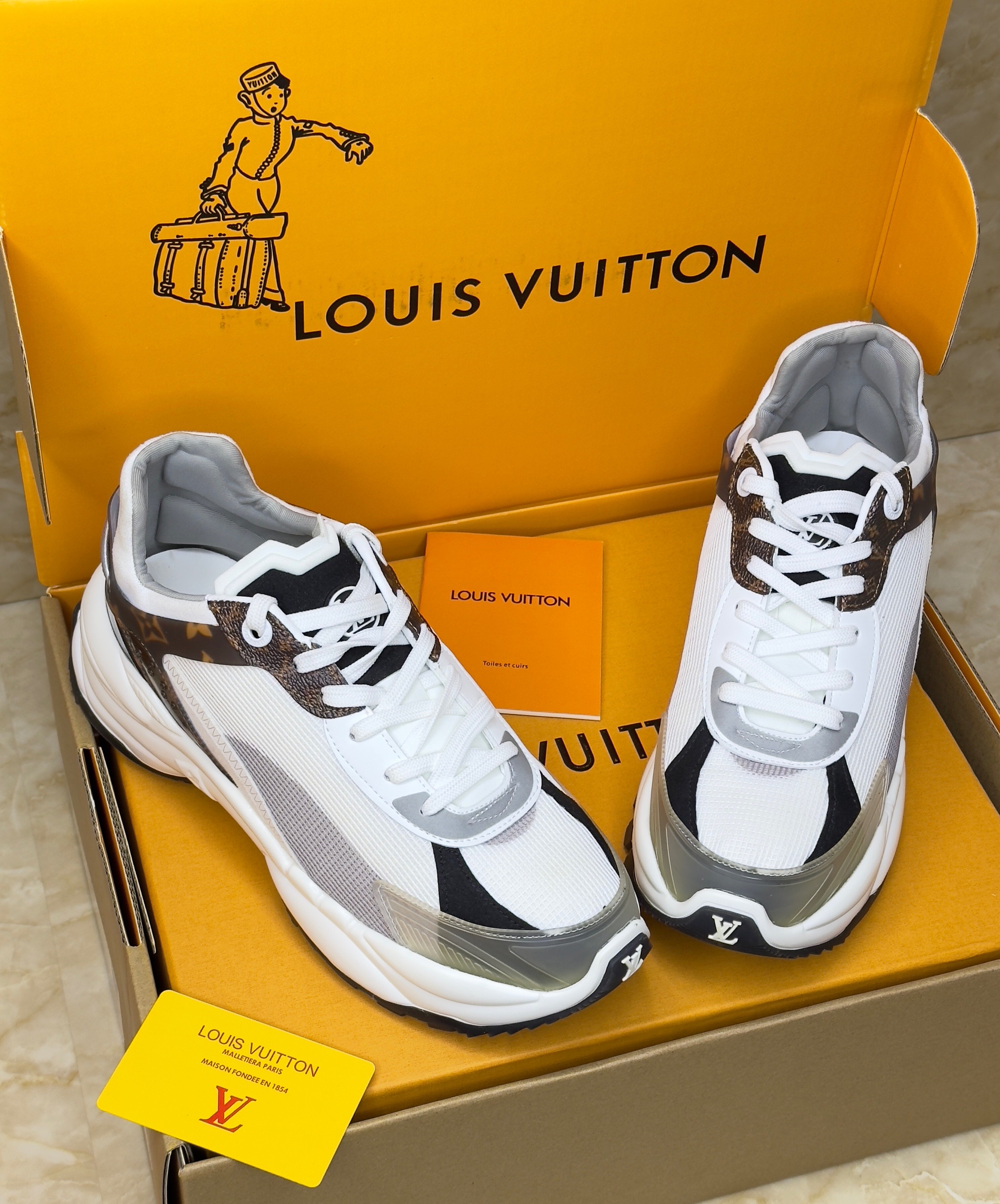 Louis Vuitton Run 55 Trainers in a mix of white technical materials and leather. image 1