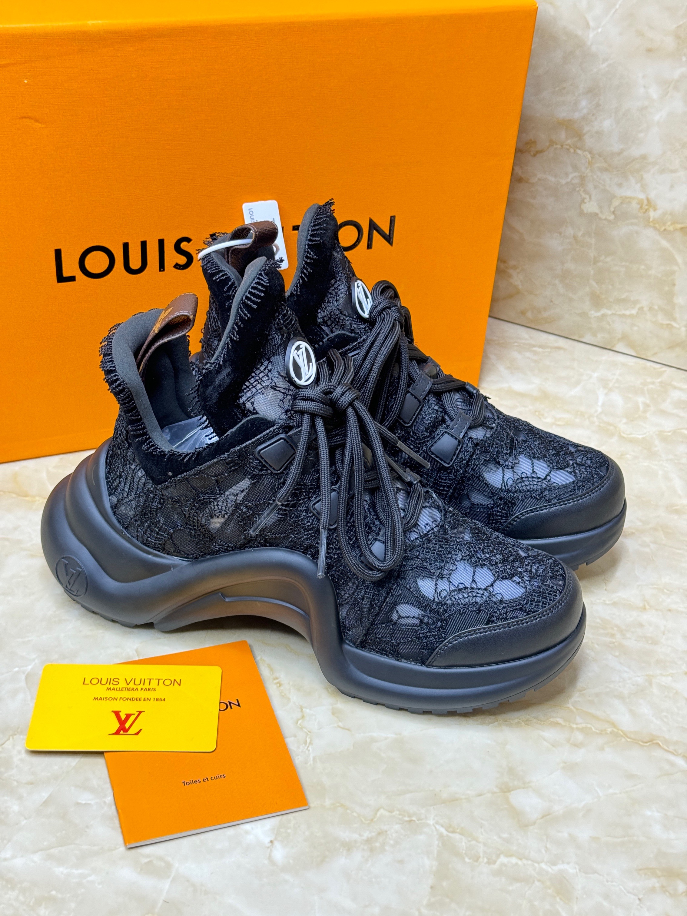 Louis Vuitton Archlight 2.0 platform sneakers with black lace detailing. image 1