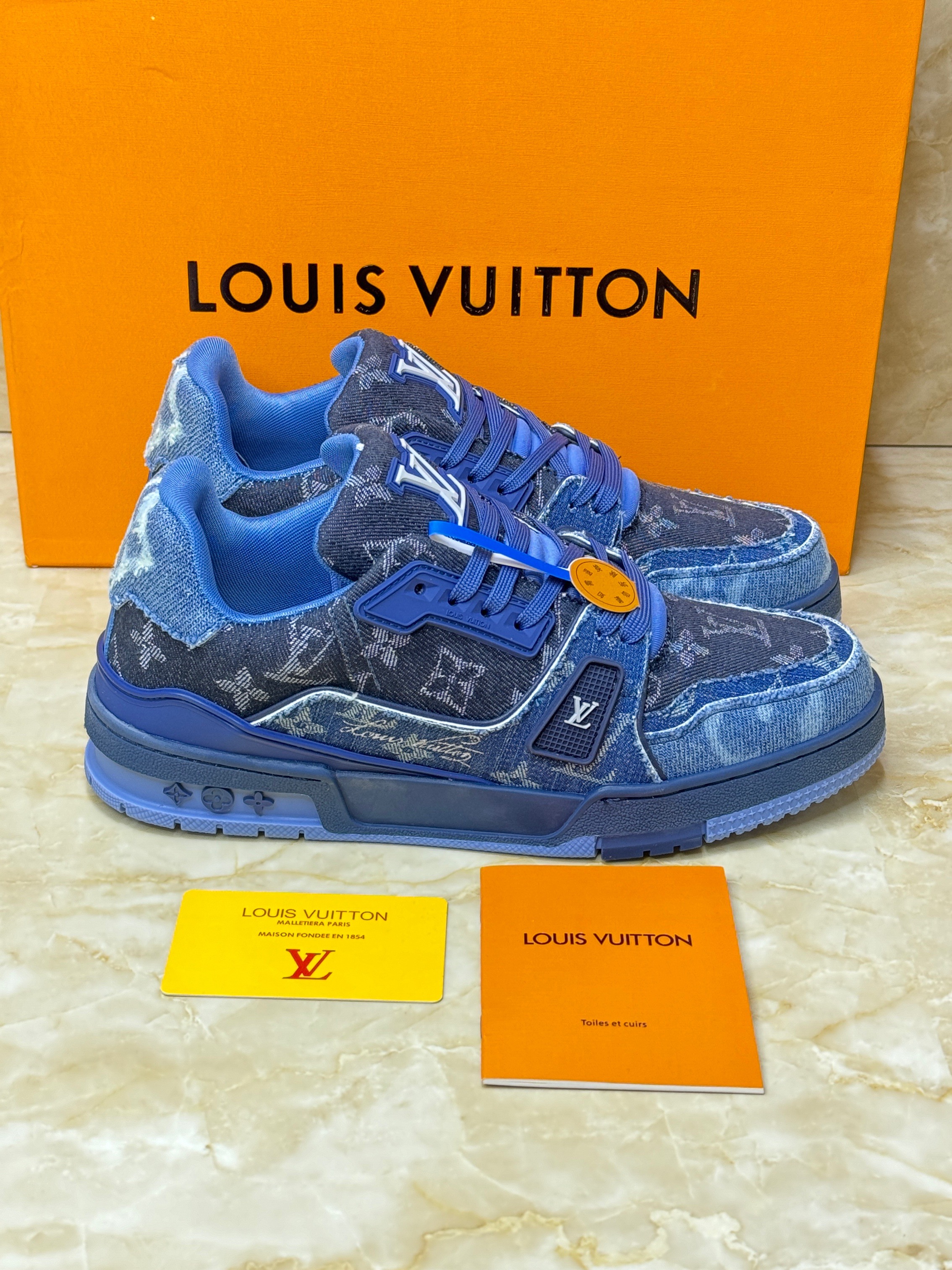 Louis Vuitton LV Trainer sneaker in blue denim and leather. image 1
