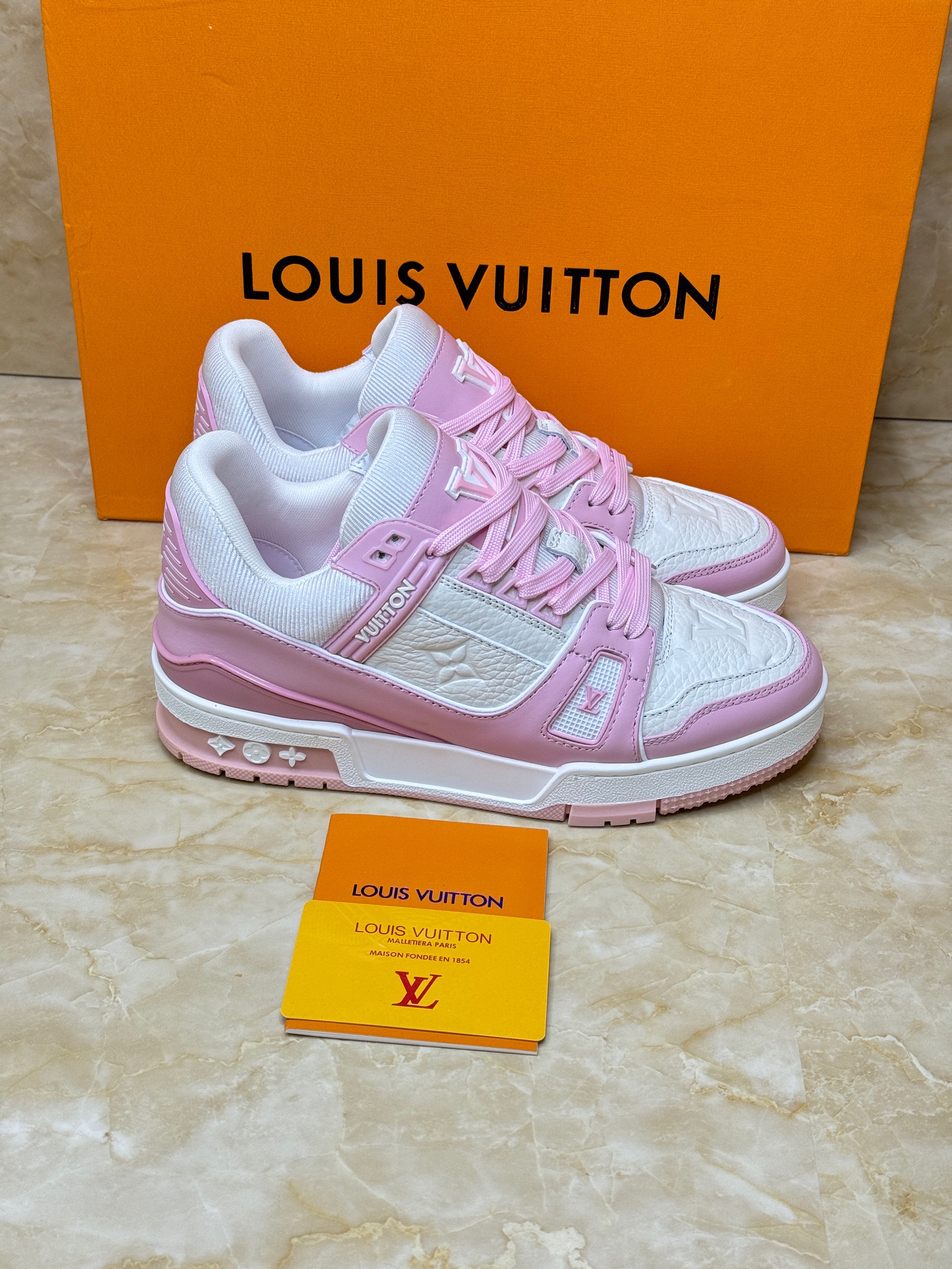 Louis Vuitton Trainer sneaker in the pink rose and white colorway. image 1