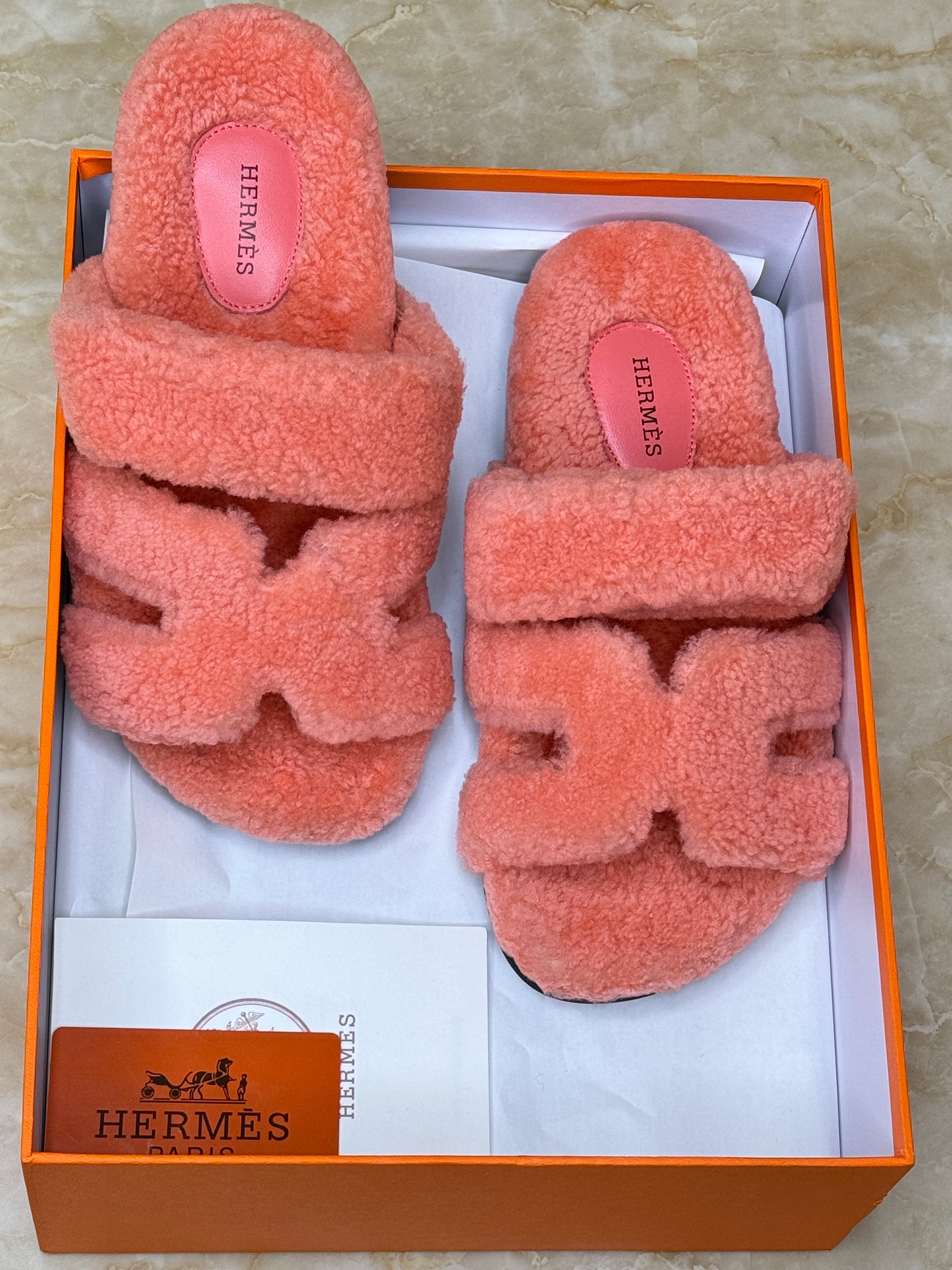 Herm?s Chypre techno sandals in a red or orange shearling wool. image 1