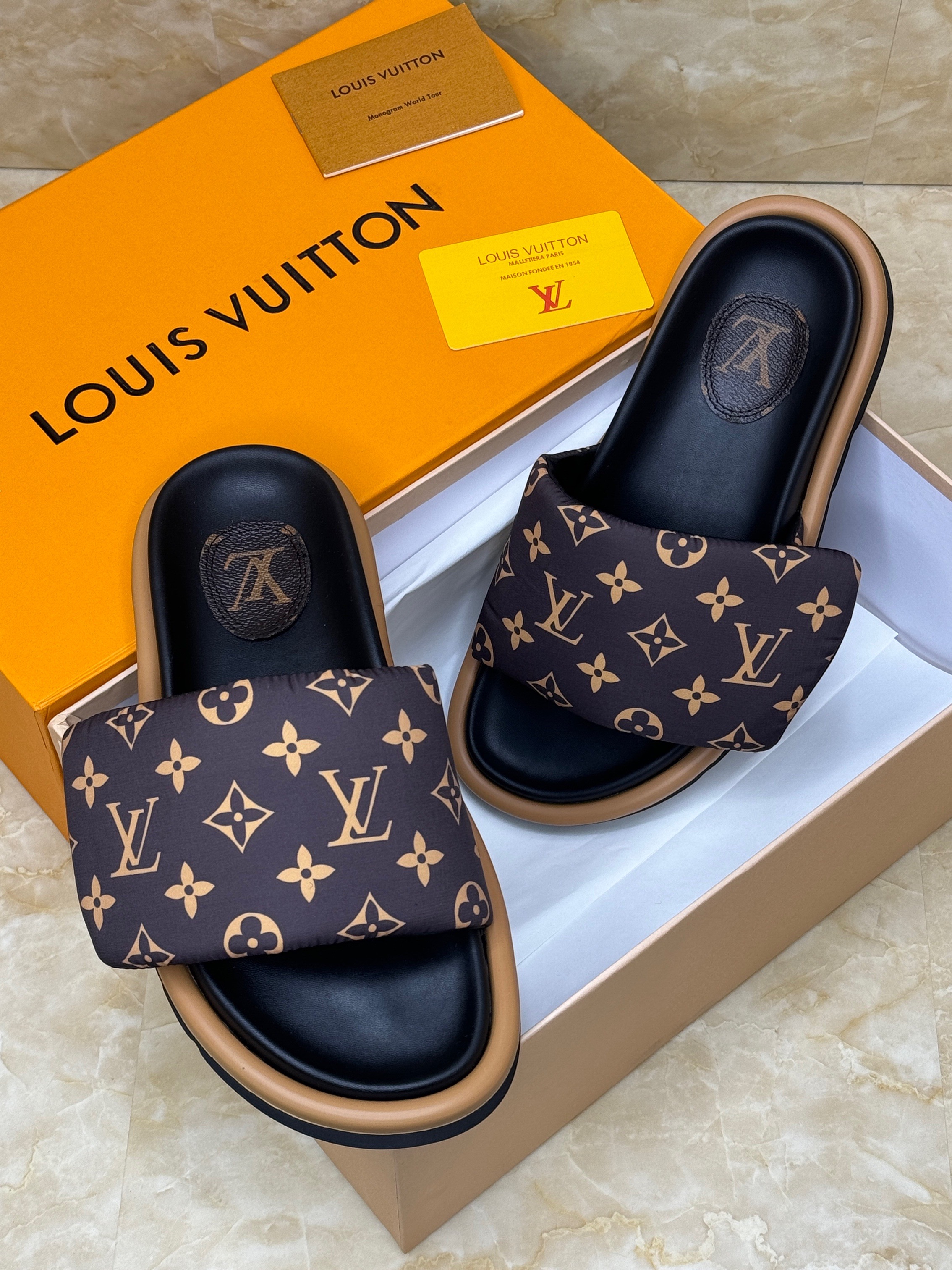 Louis Vuitton Pool Pillow Flat Comfort Mule in Monogram canvas. image 1