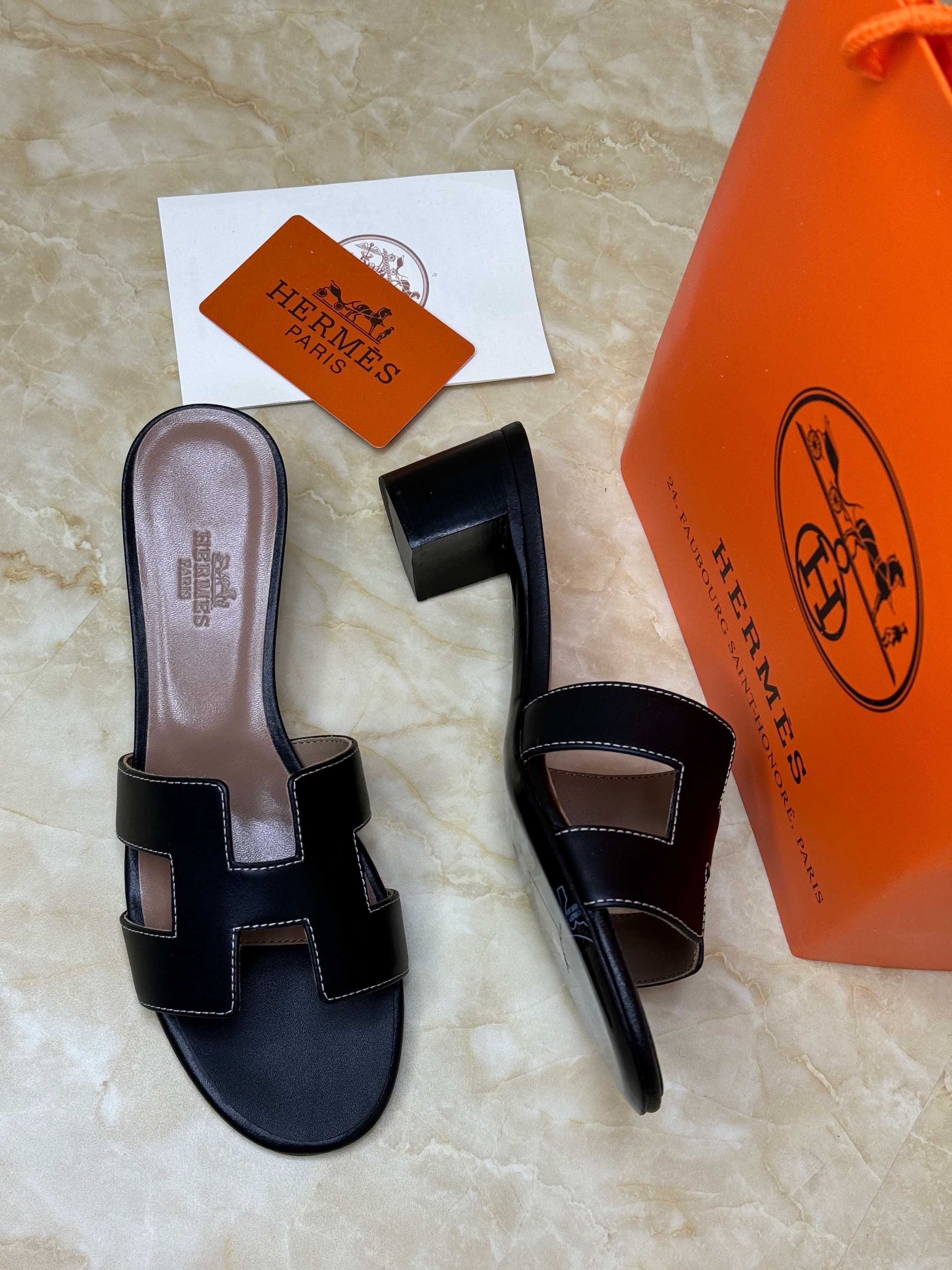 Herm?s Oran sandals with the iconic "H" cut-out design. image 1