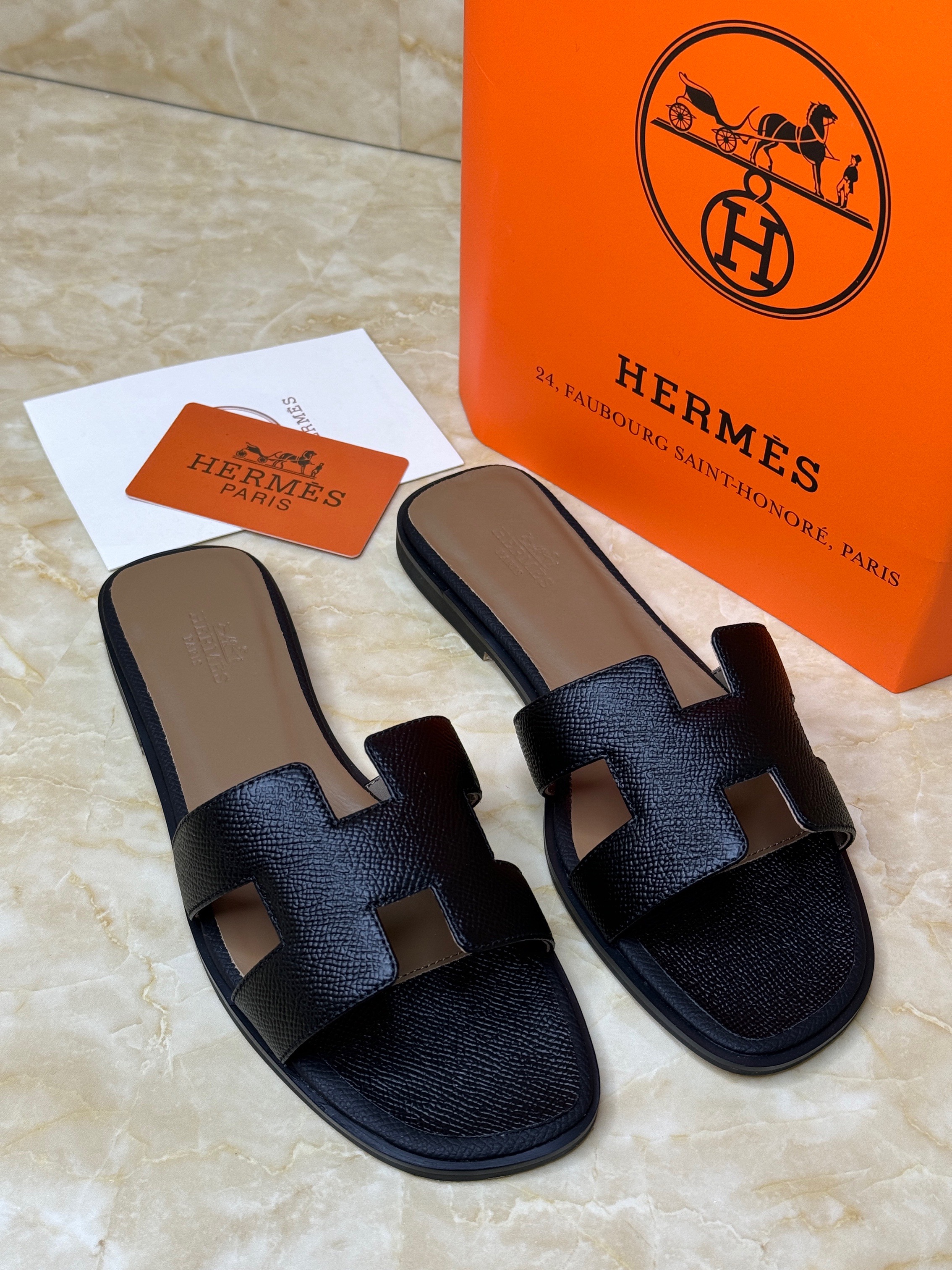 Herm?s Oran sandals in black fabric. image 1