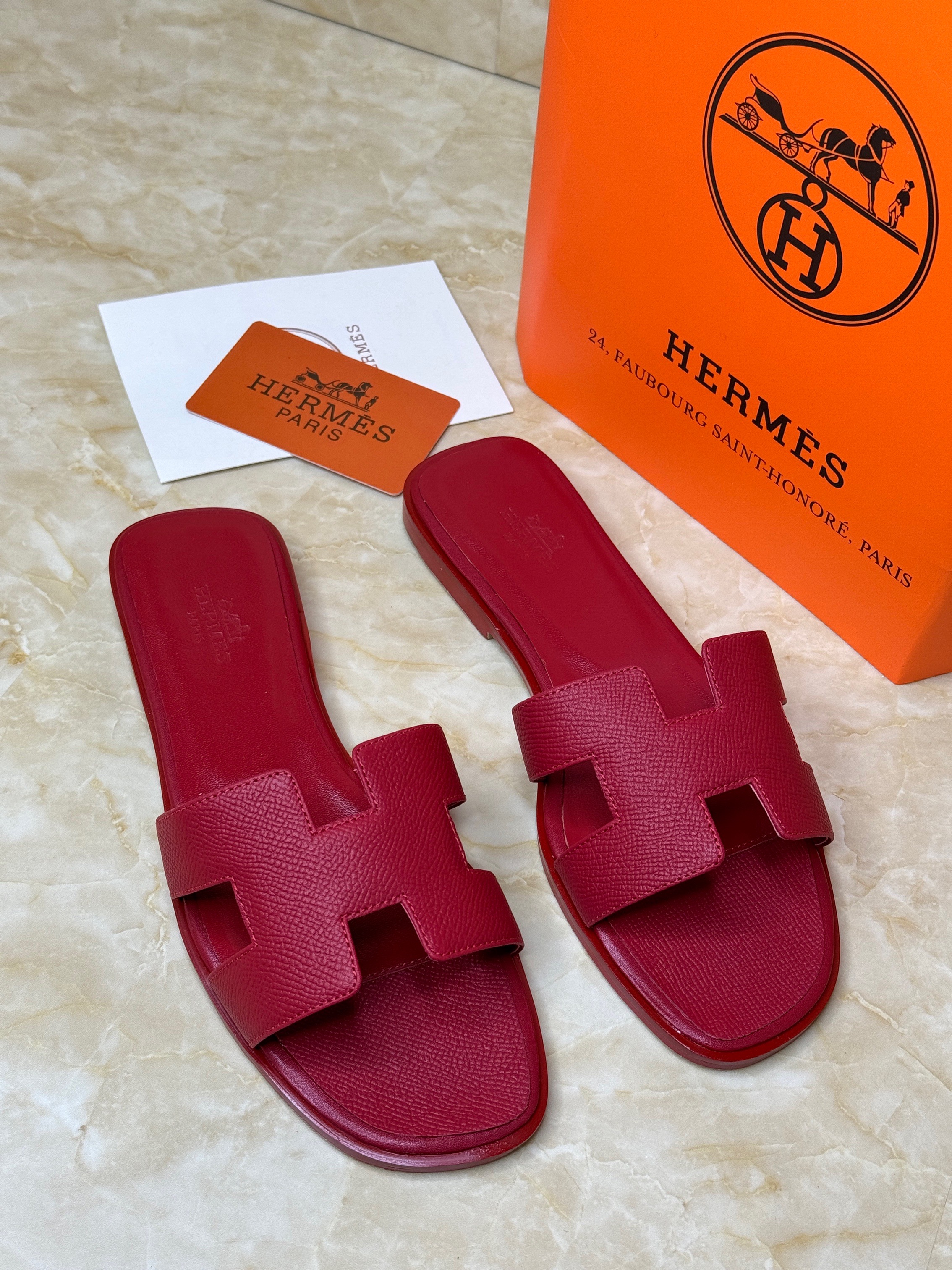 Herm?s Oran sandals with the signature "H" cut-out design. image 1