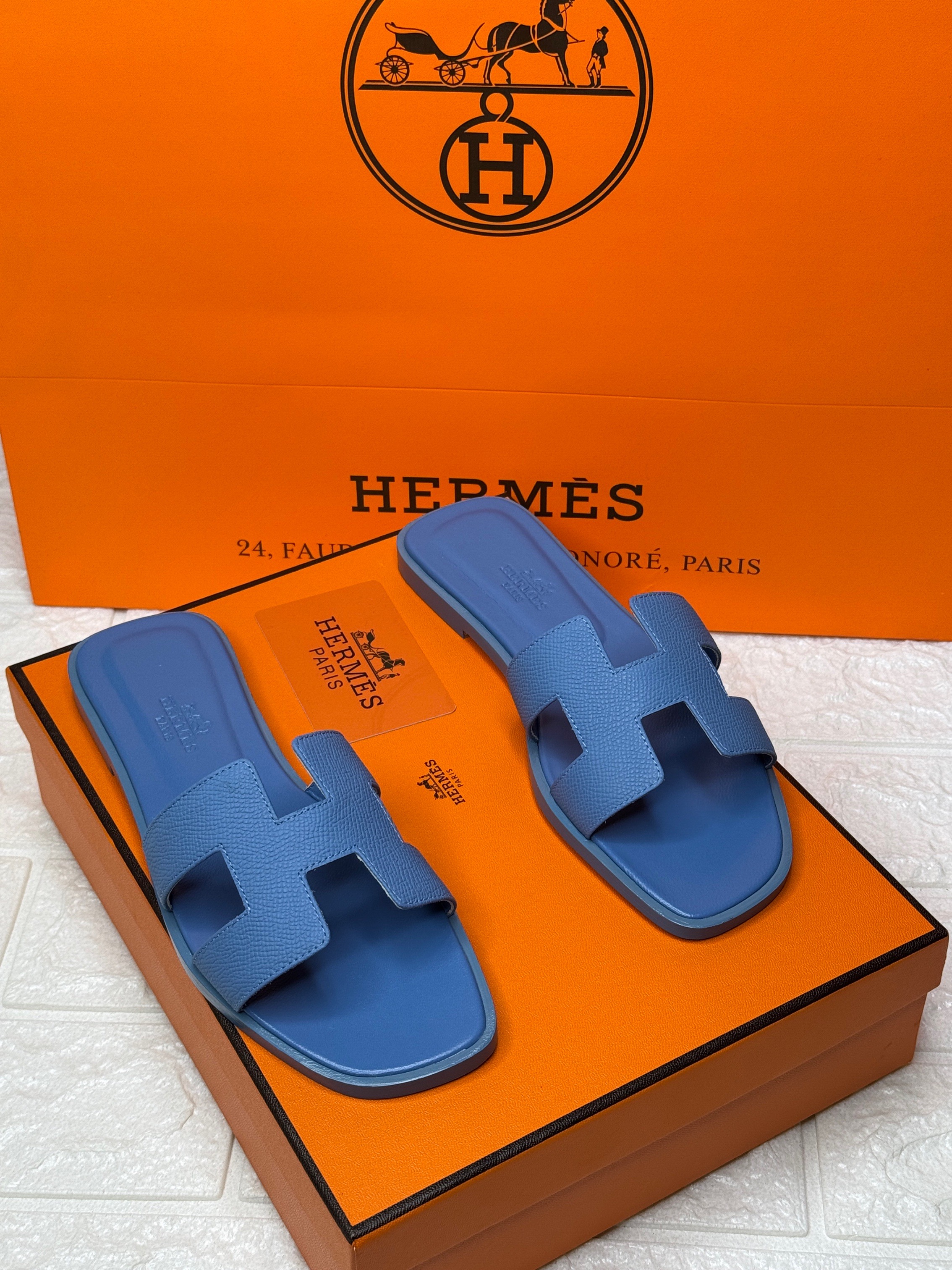 Herm?s Oran sandals in blue Epsom leather. image 1
