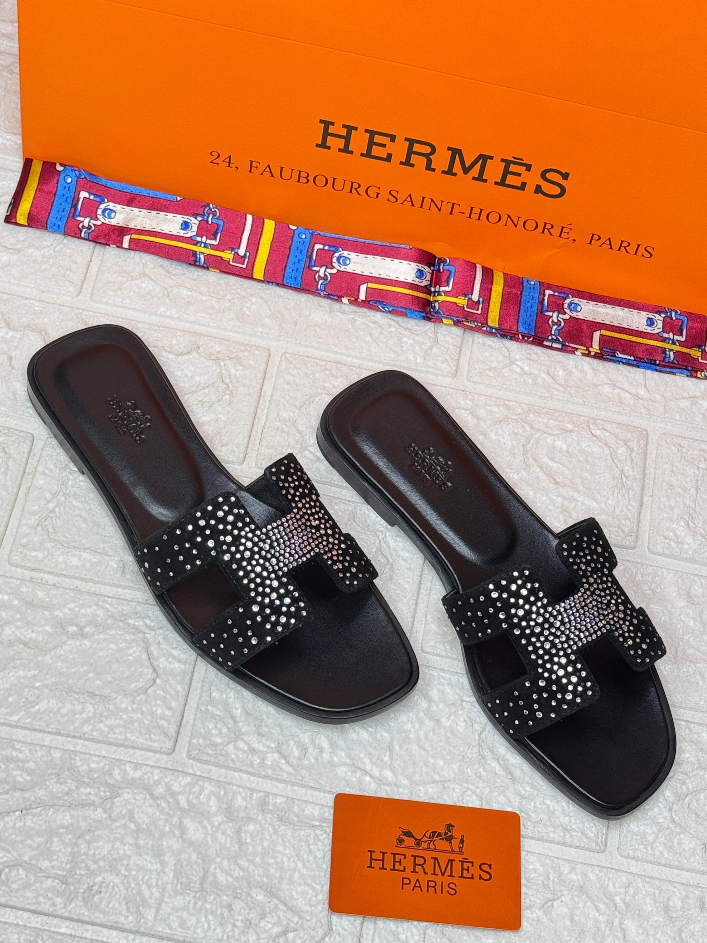 Herm?s Oran sandals in black suede goatskin with rhinestone details. image 1