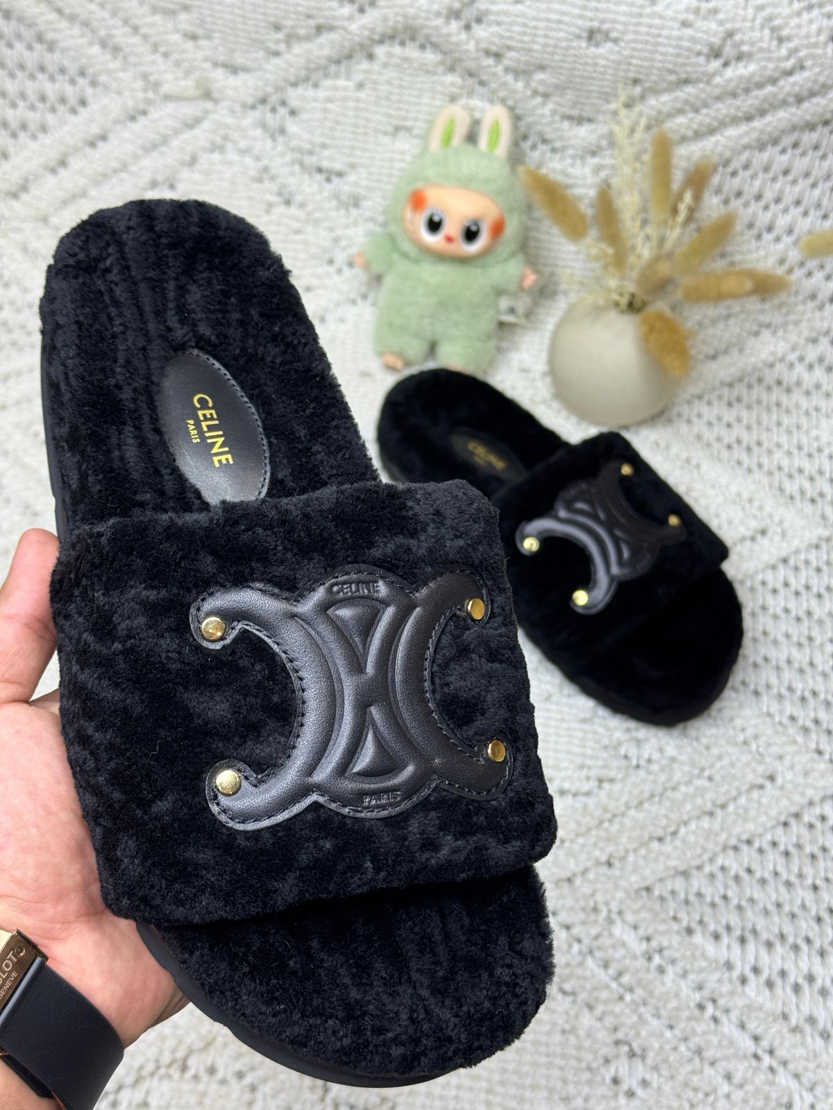 Celine Slides Triomphe in black shearling. image 1