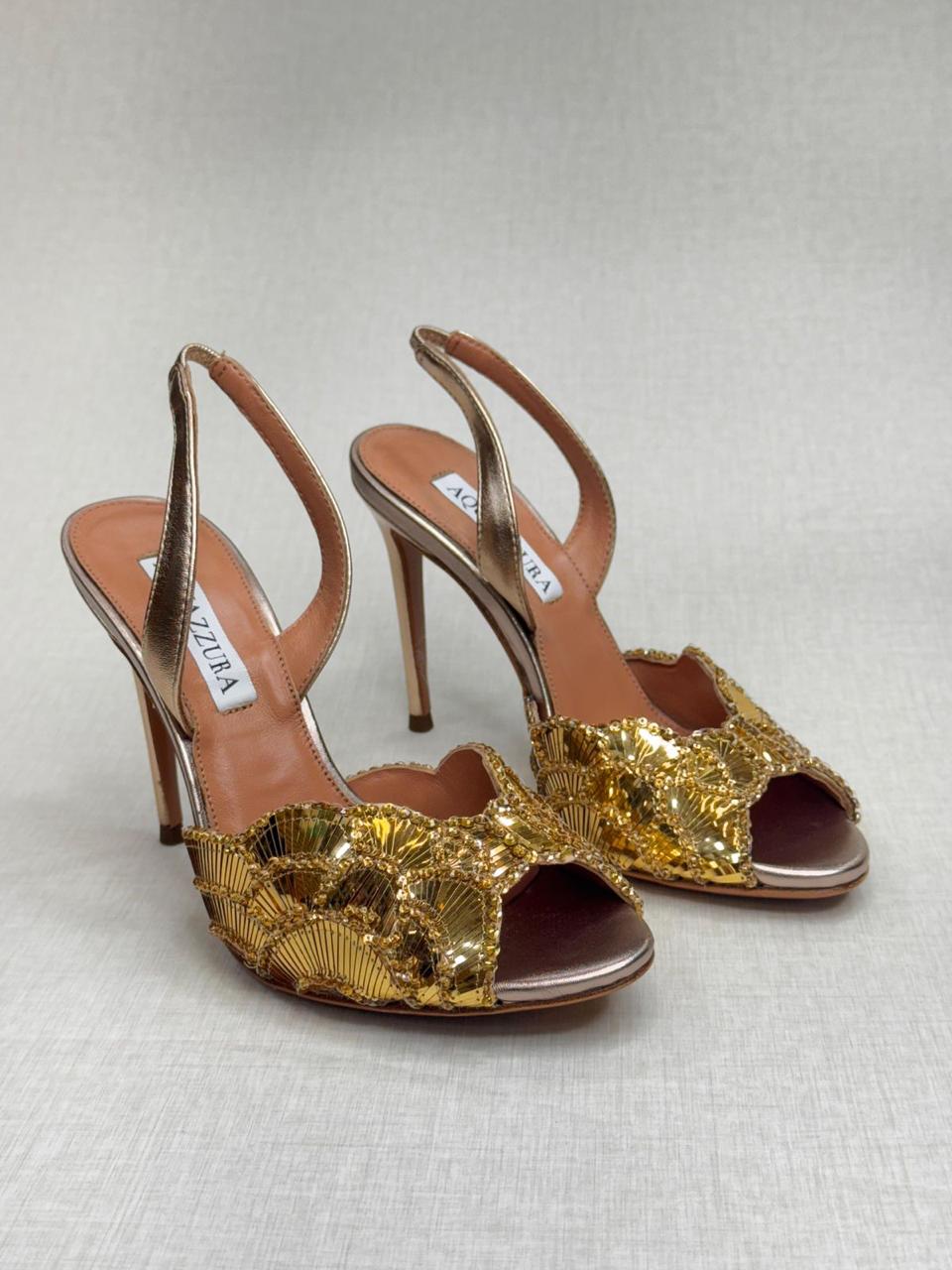 Aquazzura Ce Soir 105 sandals in gold metallic nappa leather with fan-shaped sequin and stud embellishments. image 1